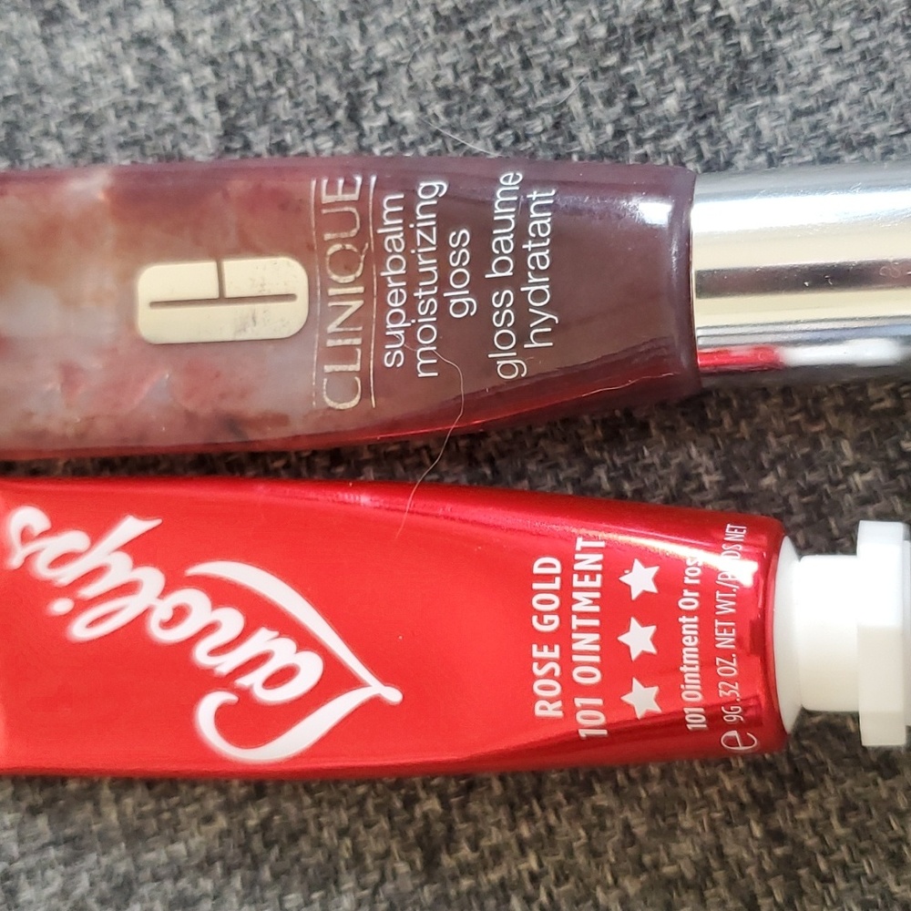 Lanolips rose gold 101 ointment and clinique superb superbalm black honey